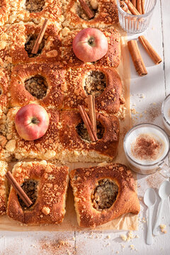 Delicious and hot apple yeast cake as traditional breakfast snack.
