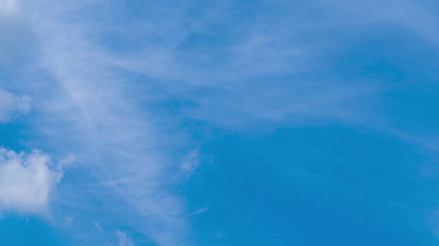 Timelapse of clouds swiftly moving across the sky. Dynamic motion of clouds in accelerated time creates mesmerizing atmospheric effect. Natural background. 4K footage. 