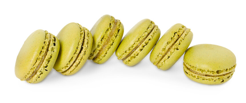 Yummy macarons. Sweet sandwich cookies with filling isolated on white