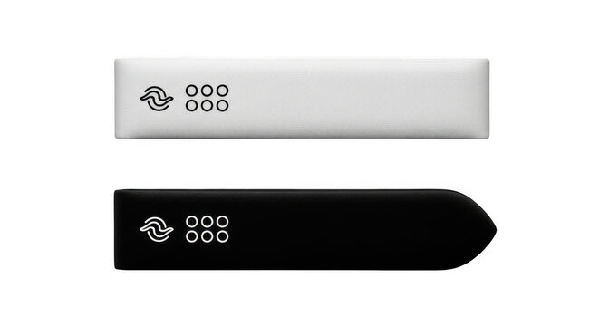 Two modern minimalist rectangular fabriccovered smart home device controllers in white and black colors isolated on transparent background