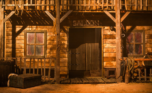Abstract country western background with wooden saloon and horse