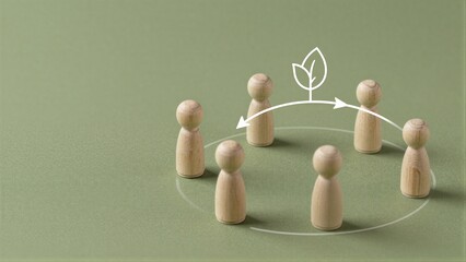 Obraz premium Four wooden figures in a circle, with leaf symbol above them.