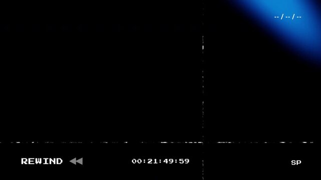 Vintage VHS rewind screen effect featuring blue light leaks and a descending digital timecode on a black background for retro analog video aesthetics and glitch transitions