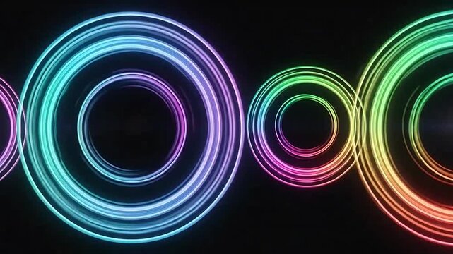 Vibrant neon light circles glow against a dark black background