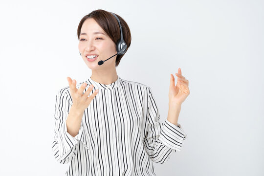 女性　ビジネス　セミナー　ヘッドセット