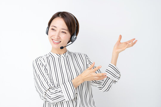 女性　ビジネス　セミナー　ヘッドセット