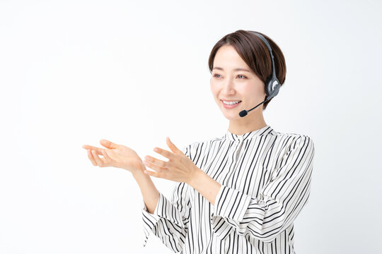 女性　ビジネス　セミナー　ヘッドセット