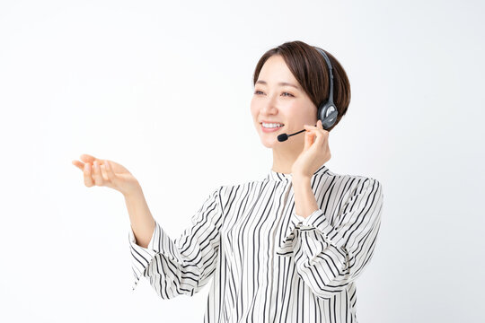 女性　ビジネス　セミナー　ヘッドセット