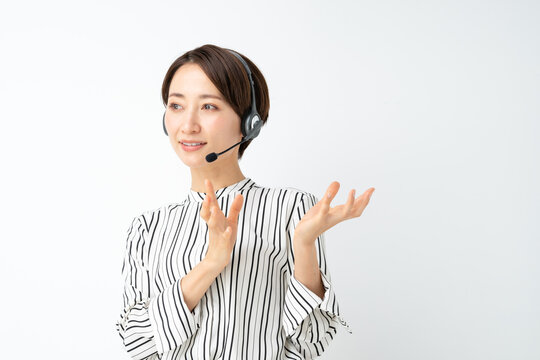 女性　ビジネス　セミナー　ヘッドセット