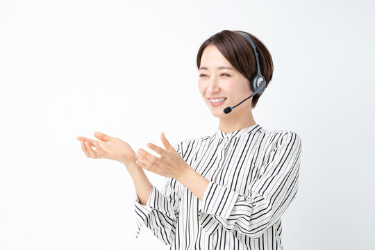 女性　ビジネス　セミナー　ヘッドセット
