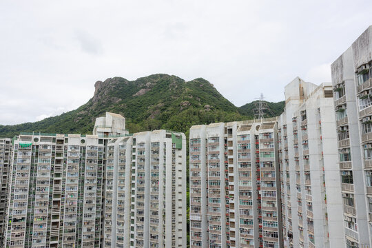 Hong Kong residential apartment building with lion rock mountain
