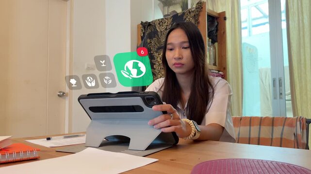 A Southeast Asian female university student utilizes her tablet to find eco-friendly conservation methods, showing a 3D tracked global leaf icon, recycling arrows, and growing plant notification badge