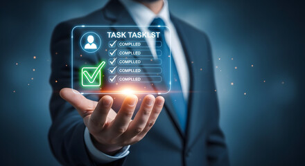 Fototapeta premium Businessman holding futuristic glowing digital task list hologram with completed checkmarks