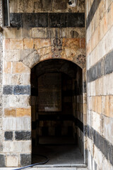 Fototapeta premium Striped Ablaq Doorway Old Damascus Building