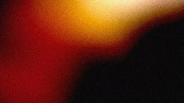 Vintage film light leak shimmering with warm glow on dark cinematic backdrop grainy analog texture with retro orange flare