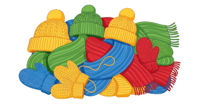 Colorful pile of knitted winter hats scarves and mittens