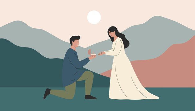 Romantic man kneeling to propose with a ring to his partner in a beautiful mountain landscape at sunset time.