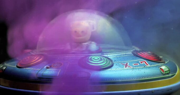 The vintage UFO toy is on fire 