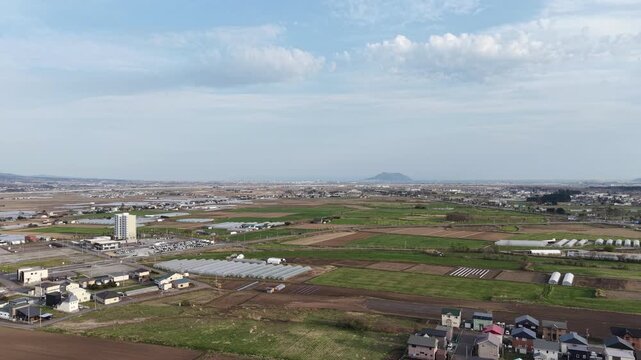 HOKKAIDO, JAPAN.Rural town area with transport lines and open fields April 26 2026
