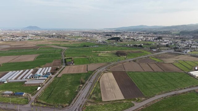 HOKKAIDO, JAPAN.Rural town area with transport lines and open fields April 26 2026