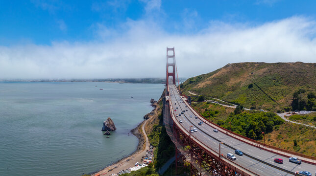Golden Gate Bridge north tower in the fog at San Francisco Bay, city of San Francisco, California CA, USA. 