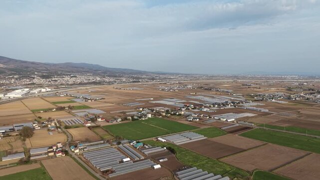 HOKKAIDO, JAPAN.Rural town area with transport lines and open fields April 26 2026