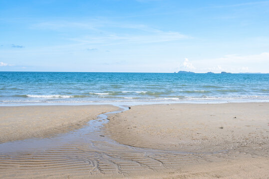 Beautiful Tropical Beach with Clear Blue Sea and Sandy Shore in Summer
