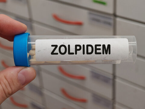 Box of ZOLPIDEM tablets on a hospital pharmacy table used to treat insomnia a sedative hypnotic.