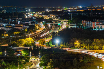 Fototapeta premium Nighttime traffic flow and urban development in Changping District, Beijing, China
