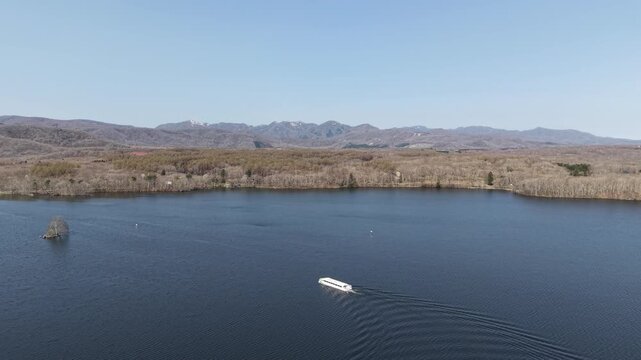 HOKKAIDO, JAPAN.Natural park with scenic lake and volcanic peaks April 26 2026