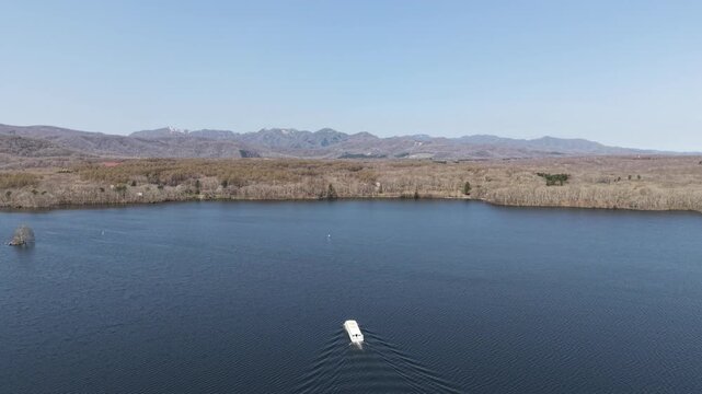 HOKKAIDO, JAPAN.Natural park with scenic lake and volcanic peaks April 26 2026
