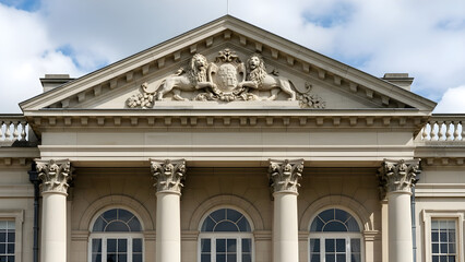 Obraz premium A majestic building facade with ornate columns and sculptures under a cloudy sky