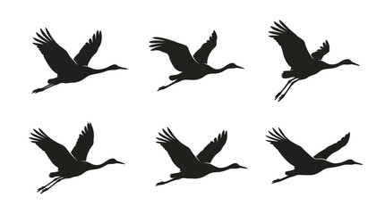 Fototapeta premium Flying crane silhouettes set, migratory birds in flight vector