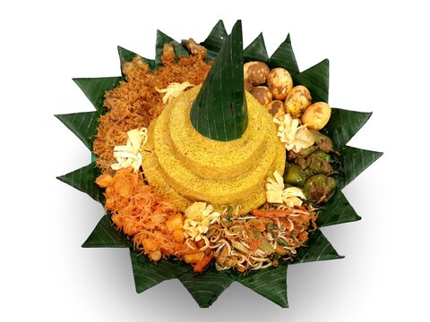 Nasi tumpeng is a traditional Indonesian dish, served in a cone shape and arranged with various side dishes, usually presented at traditional ceremonies and special occasions.
