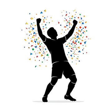 man celebrating with arms raised in confetti
