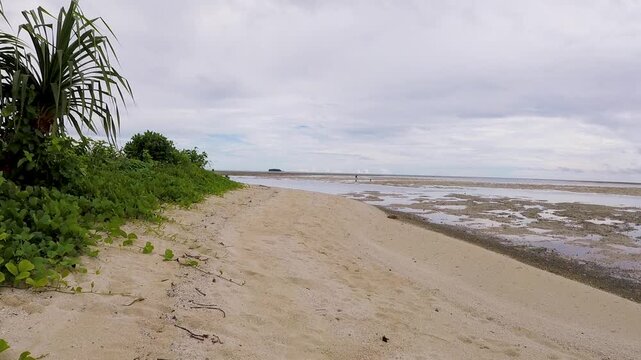 Scenic view remote sandy beach in Buka on the tropical island of Bougainville, Papua New Guinea
