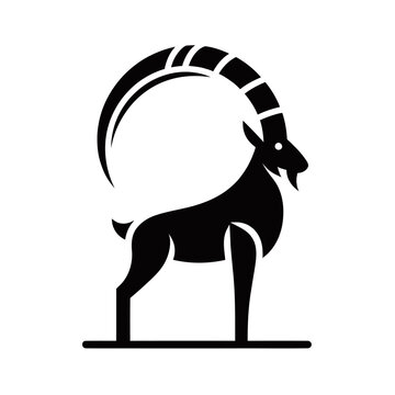 A stylized black silhouette of an ibex with large, curved horns stands on a flat surface.