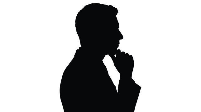 Silhouette of a man in profile with his hand on his chin, deep in thought