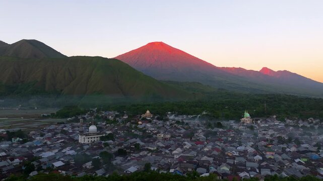 Mount Rinjani Glowing at Dawn from a Distance | Cinematic Aerial Footage Lombok Indonesia Sunrise at Bukit Selong