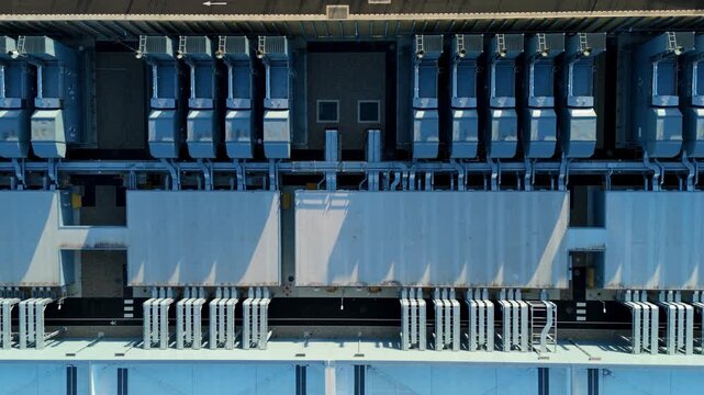 Aerial view of the Google Data Centre in Waltham Cross showing industrial cooling units and HVAC infrastructure on the roof in Cheshunt, England, United Kingdom.