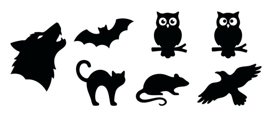 Obraz premium Halloween animal black silhouette set featuring howling wolf flying bat owls cat rodent crow isolated on white background for spooky vector illustration design and creative holiday decoration projects