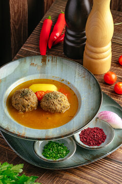 Hearty meatball soup with potatoes and spices