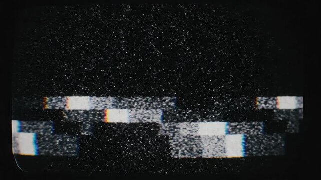 Black background with blocks of white noise creating a digital glitch effect across the dark screen