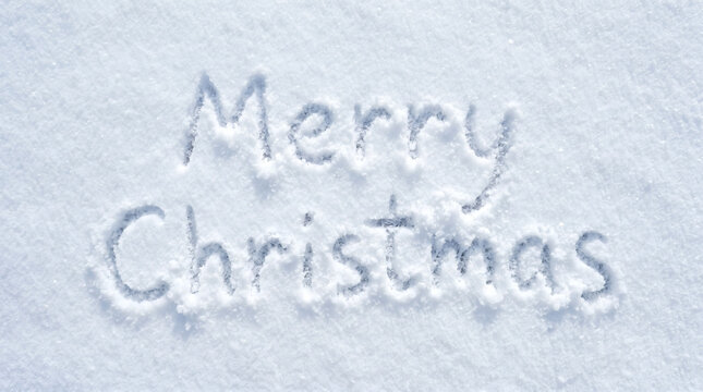 Merry Christmas Message Written in Fresh Snow Background