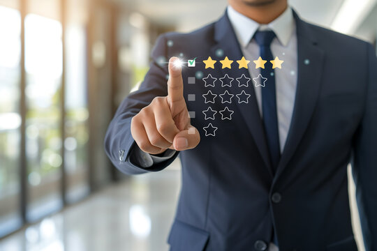 The business person is pressing a button on the touchscreen to give a five-star rating