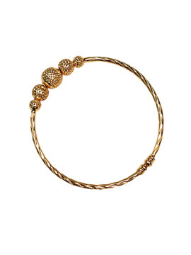 Premium gold bangle with textured spherical beads, transparent design for luxury jewelry retail