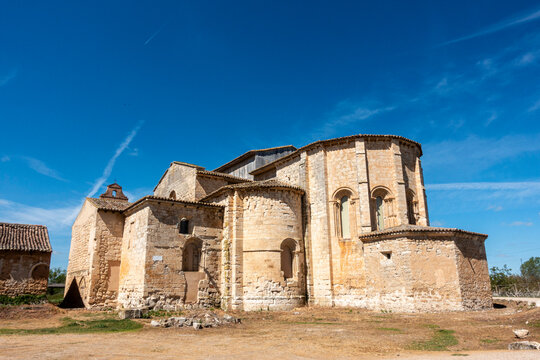 Exterior panoramic view of the 13th-century Cistercian Romanesque church and apses of the Monastery of Santa Maria de Palazuelos in Corcos del Valle, Valladolid, Castilla y Leon, Spain