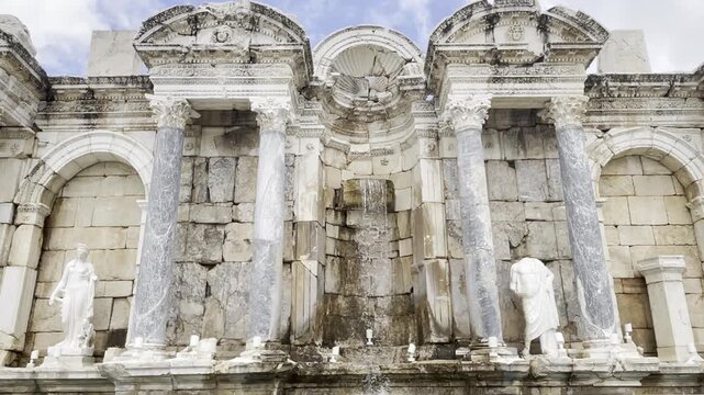 grand Antonine Nymphaeum monumental fountain with ornate sculptures in Sagalassos ancient city, Turkey. Roman heritage