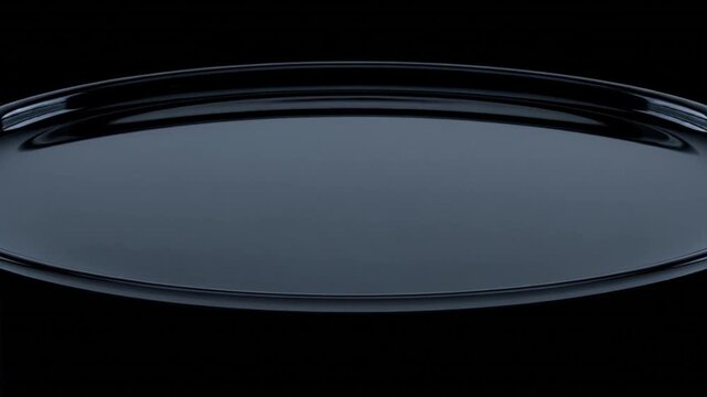 漆黒の液滴が表面張力の崩壊により排除され平滑な流体面が復元される抽象CG背景