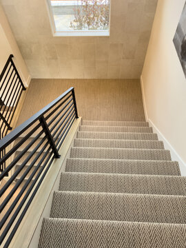Top View of Carpeted Stairs and Window